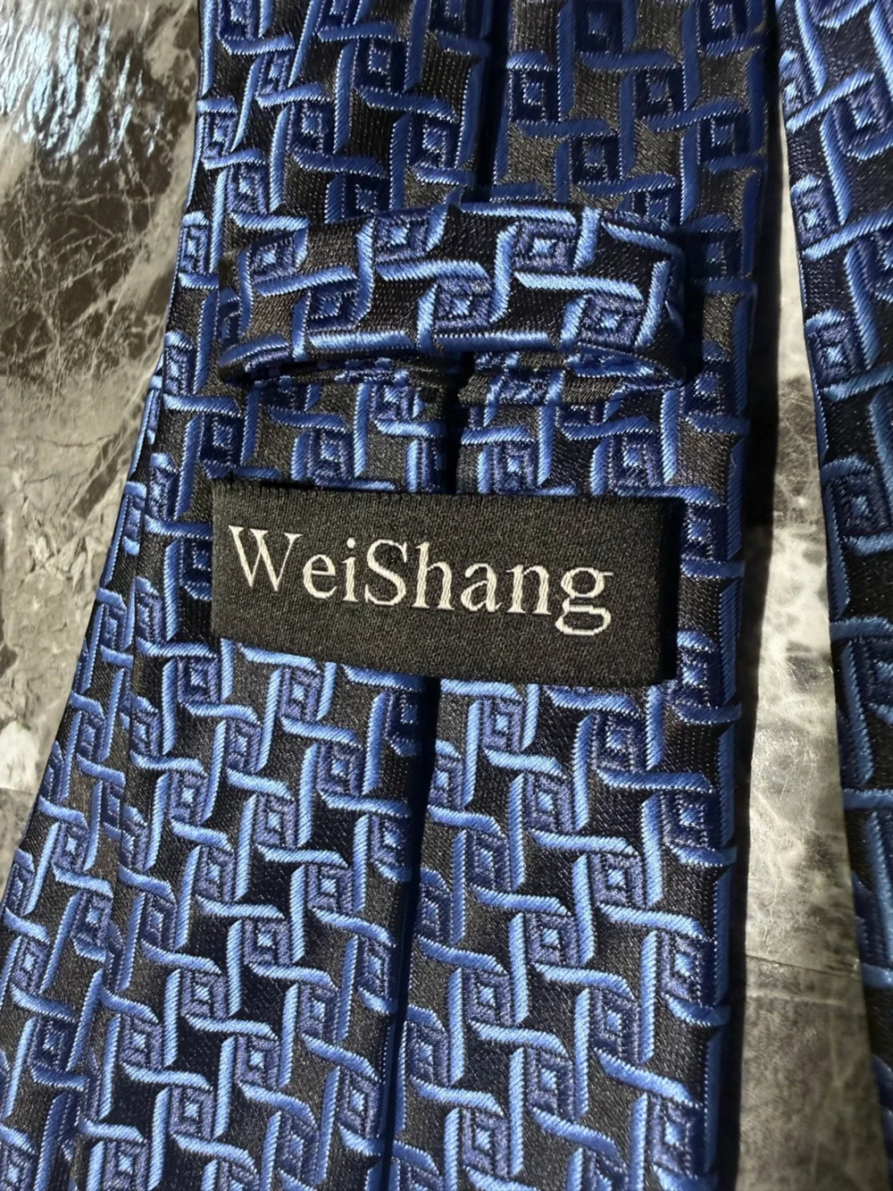 Men’s WeiShang tie in purple/blue/black geometric print
